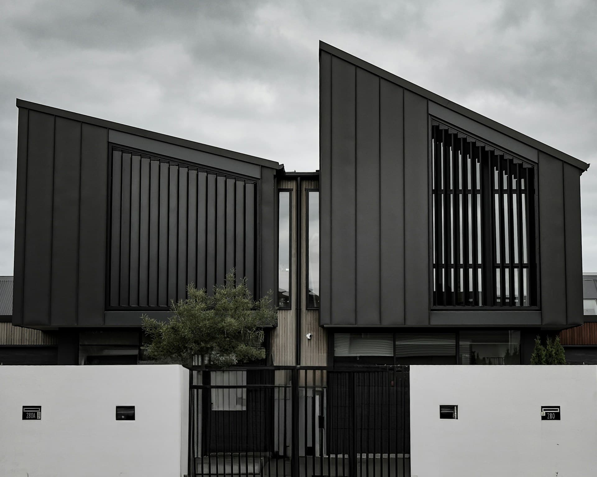 Bright modern dining room with table, chairs, and large windows